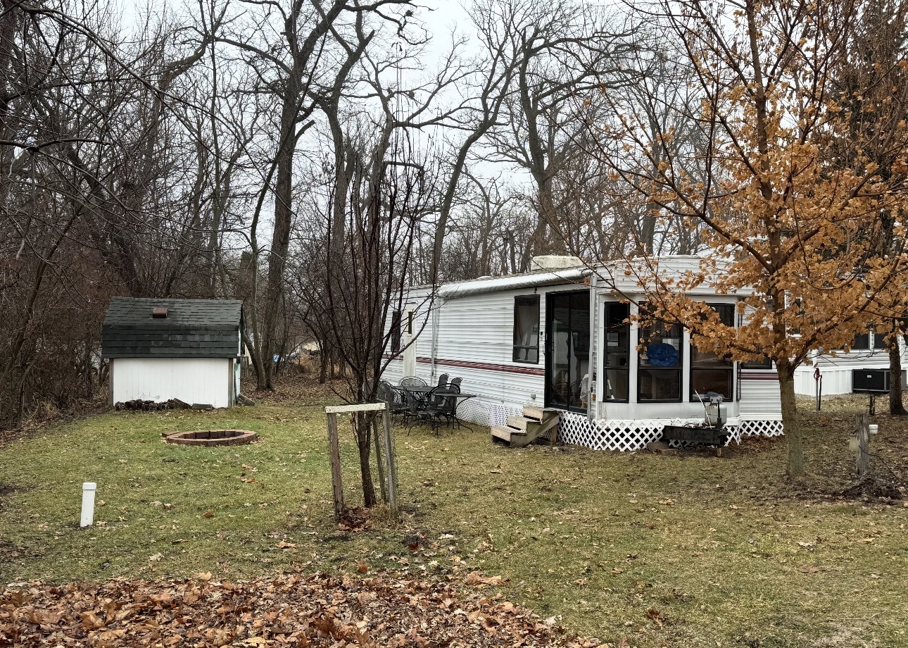 23-121 Woodhaven Lakes, Sublette, IL 61367